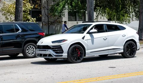 Miami Beach, Florida USA - April 15, 2021: 2019 Giallo Auge Lamborghini Urus Stock Photos