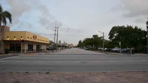 Miami Beach intersection with small building Stock Footage 113629422