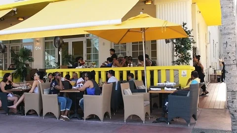 Miami Beach, USA panning driving on South Beach Ocean Drive yellow Leslie Stock Footage 101752591