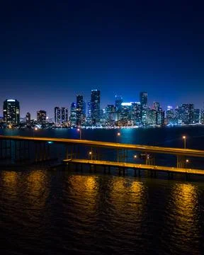 Miami cityscape of downtown with buildings and metro area behind the bay Stock Photos