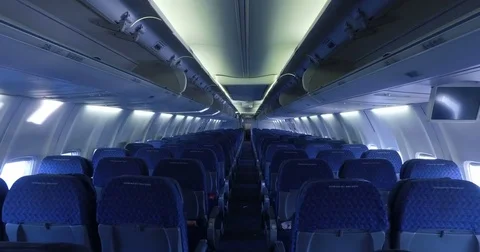 MIAMI, FLORIDA: Smooth &amp; steady slow motion shot inside airplane 스톡 동영상 75327016