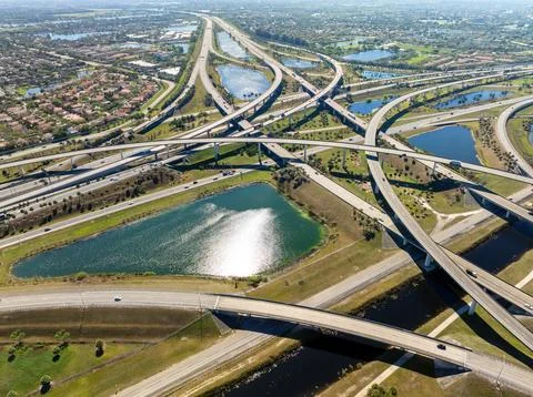 Miami freeway interchange with elevated road lanes for fast express driving of Stock Photos