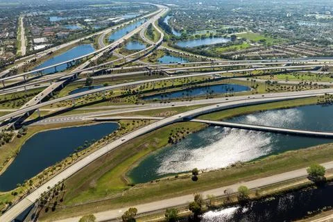 Miami freeway interchange with elevated road lanes for fast express driving o Stock Photos