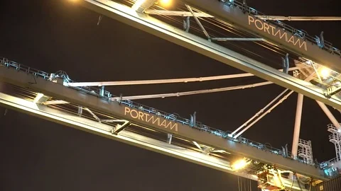 Miami Industrial Container Cargo freight ship with working crane bridge in shipy Stock Footage 75579993