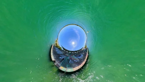 Miami Marine Stadium inverted tiny planet aerial drone video Stock Footage 334794200