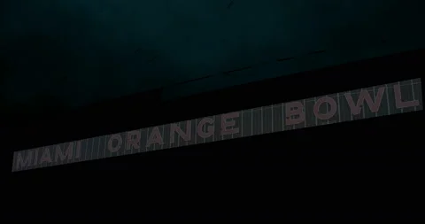 Miami Orange Bowl Stadium Miami Florida night storm with lightning bolt Stock Footage 166679253