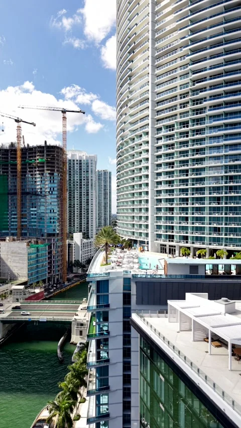Miami river between Brickell and Miami. View of hotels with swimming pools .. Stock Footage 321648616