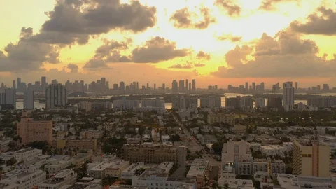 Miami sunset with sky and clouds aerial pull out shot 4k Video stock 115951065