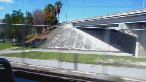 Miami Train Ride Under Highway Underpasses Stock Footage 237855780