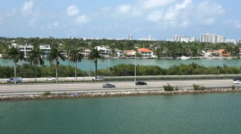 MIAMI,FLORIDA,USA-MAY 2015. Parallel view of highway  I 95 from the sea side 4K. Stock Footage 68523341