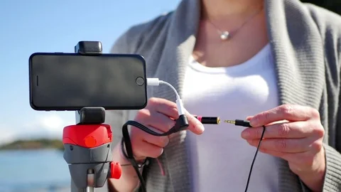 Mic Audio Connected into Lighting Port Cable IPhone Video Production Setup Stock Footage 83851580