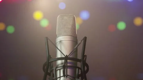 Mic - Microphone On Stage w/ Bokeh, Lasers &amp; Disco Lights in Background Stock Footage 56143102