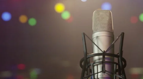 Mic - Microphone On Stage w/ Bokeh, Lasers &amp; Disco Lights in Background Stock Footage 56145064