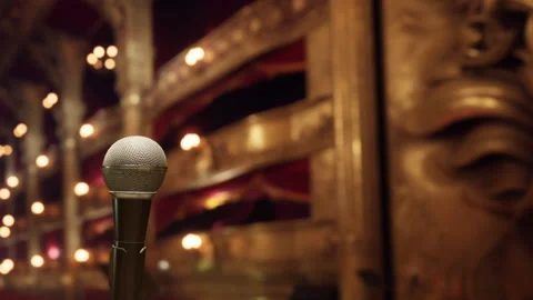 Mic stands on stage at a theater before a performance in the evening Stock Footage 342041162