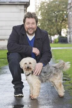 Michael Ball And His Bionic Dog Freddie The Tibetan Terrier Who Had Pioneering H Stock Photos