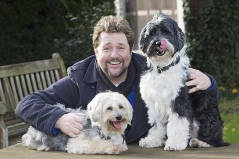 Michael Ball And His Bionic Dog Freddie The Tibetan Terrier (left) Who Had Pione Stock Photos