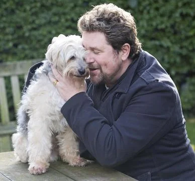 Michael Ball And His Bionic Dog Freddie The Tibetan Terrier Who Had Pioneering H Stock Photos