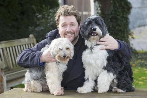 Michael Ball And His Bionic Dog Freddie The Tibetan Terrier (left) Who Had Pione Stock Photos