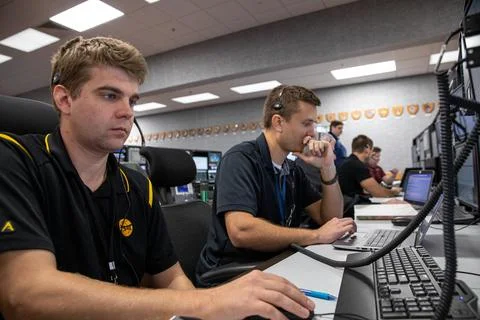 Michael Dennison, left, and James Ross, ground cooling system engineers at .. Stock Photos