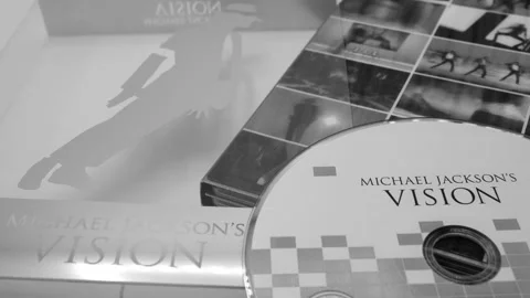 Michael Jackson VISION CD and DVD graphics with the collection of his best .. Stock Footage 223765998