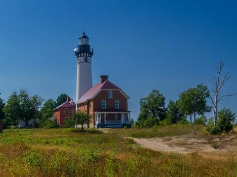 Michigan lighthouse au sable lighthouse lighthouse with blue sky Stock Photos