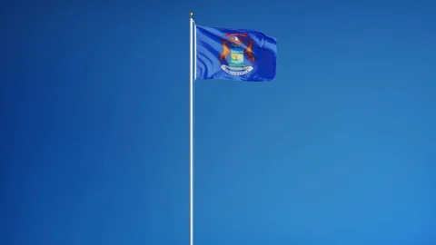 Michigan (U.S. state) flag in slow motion seamlessly looped with alpha Stock Footage 70007003