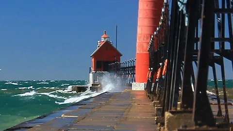Michigan's Grand Haven Lighthouse During High Winds And Waves Stock Footage 115850175