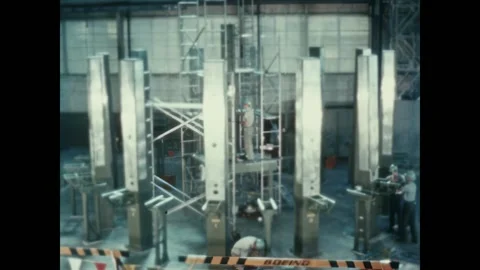 MICHOUD - 1963 - Construction workers walk on concrete spacers on rebar mesh. Video stock 323261020
