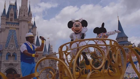 Mickey and Minnies Surprise Celebration parade on cloudy Stock Footage