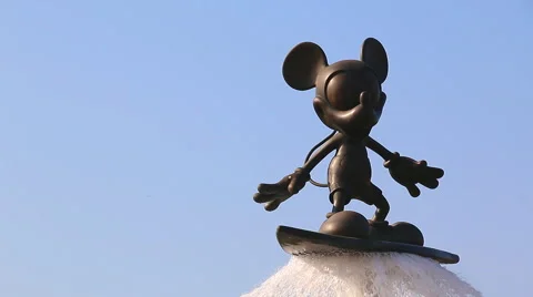 Mickey Mouse Statue On Surfboard Is Cute The Fountain Stock Footage 50231382