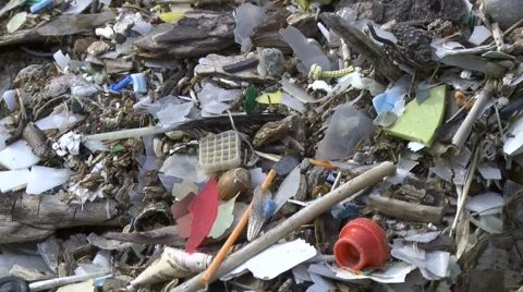 Micro déchets sur une plage - Micros waste on a beach Stock Footage 62789926