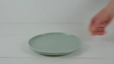 Micro green on a plate on a white background Stock Footage 238523635