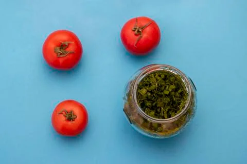 Micro greens with tomatoes, top view. Healthy lifestyle Stock Photos