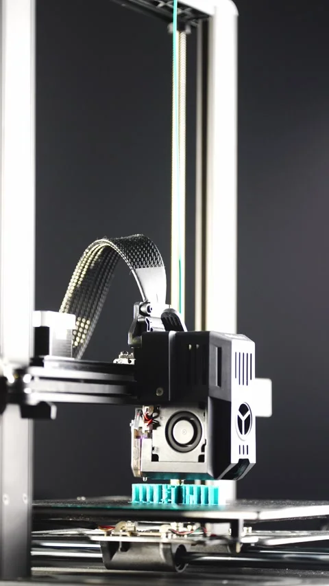 With micro movements, the 3D printer produces a programmed part. Stock Footage 314461922