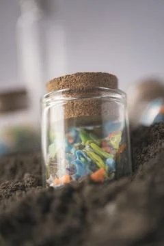 Micro plastic fragments found in the soil. Stock Photos