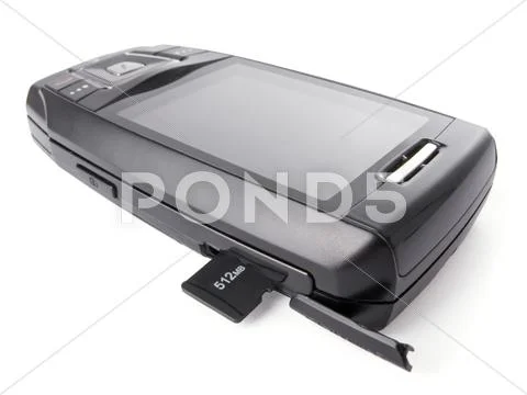Micro sd card half inserted into the mobile phone port Stock Photos