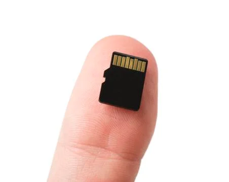 Micro SD Card on Thumb Stock Photos