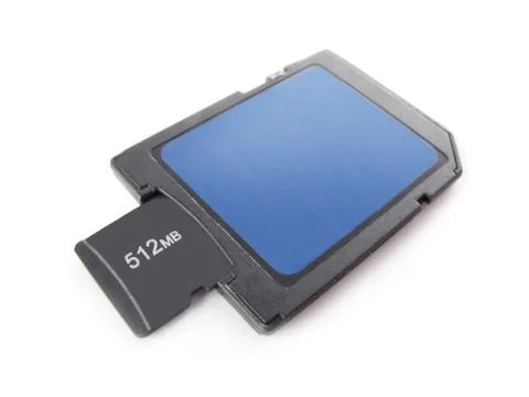 Micro sd memory card half inserted into its adapter Stock Photos