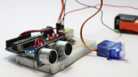 Micro servo shows movements when obstacle is detected by ultrasonic sensor Video stock 166824832