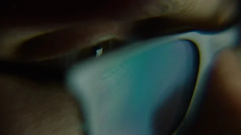 Micro shot of a man looking through architectural blueprints Vídeos de archivo 124980269