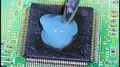 Micro Soldering IC Chip on Circuit Board - Close Up Stock Footage 333436117