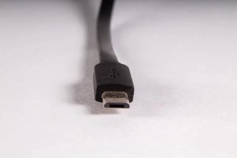 Micro usb black wire on white background Stock Photos