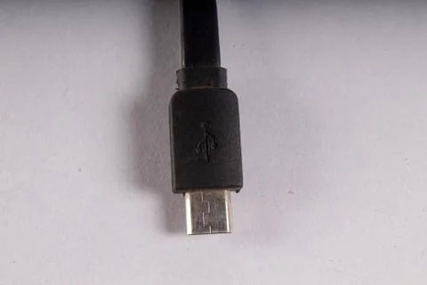 Micro usb black wire on white background Stock Photos