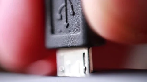 Micro USB cable connecting closeup Stock Footage 85463299