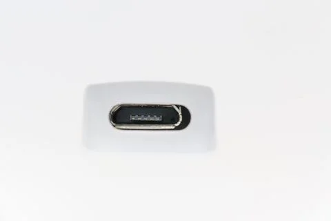 Micro USB port with clear view on a white background in good light Stock Photos