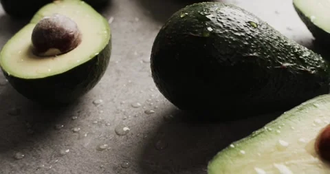 Micro video of close up of avocados with copy space on grey background Stock Footage 331246507