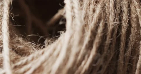 Micro video of close up of brown string with copy space Stock Footage 248672358