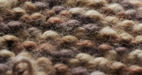 Micro video of close up of brown wooly crochet fabric with copy space Stock Footage 331295271