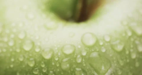 Micro video of close up of green apple with water drops and copy space Stock Footage 331246533