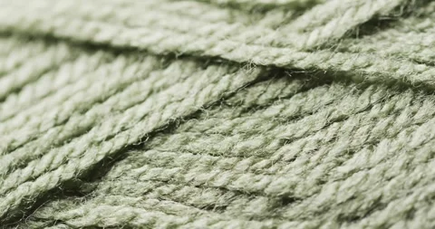 Micro video of close up of green woolly threads with copy space Stock Footage 331295269